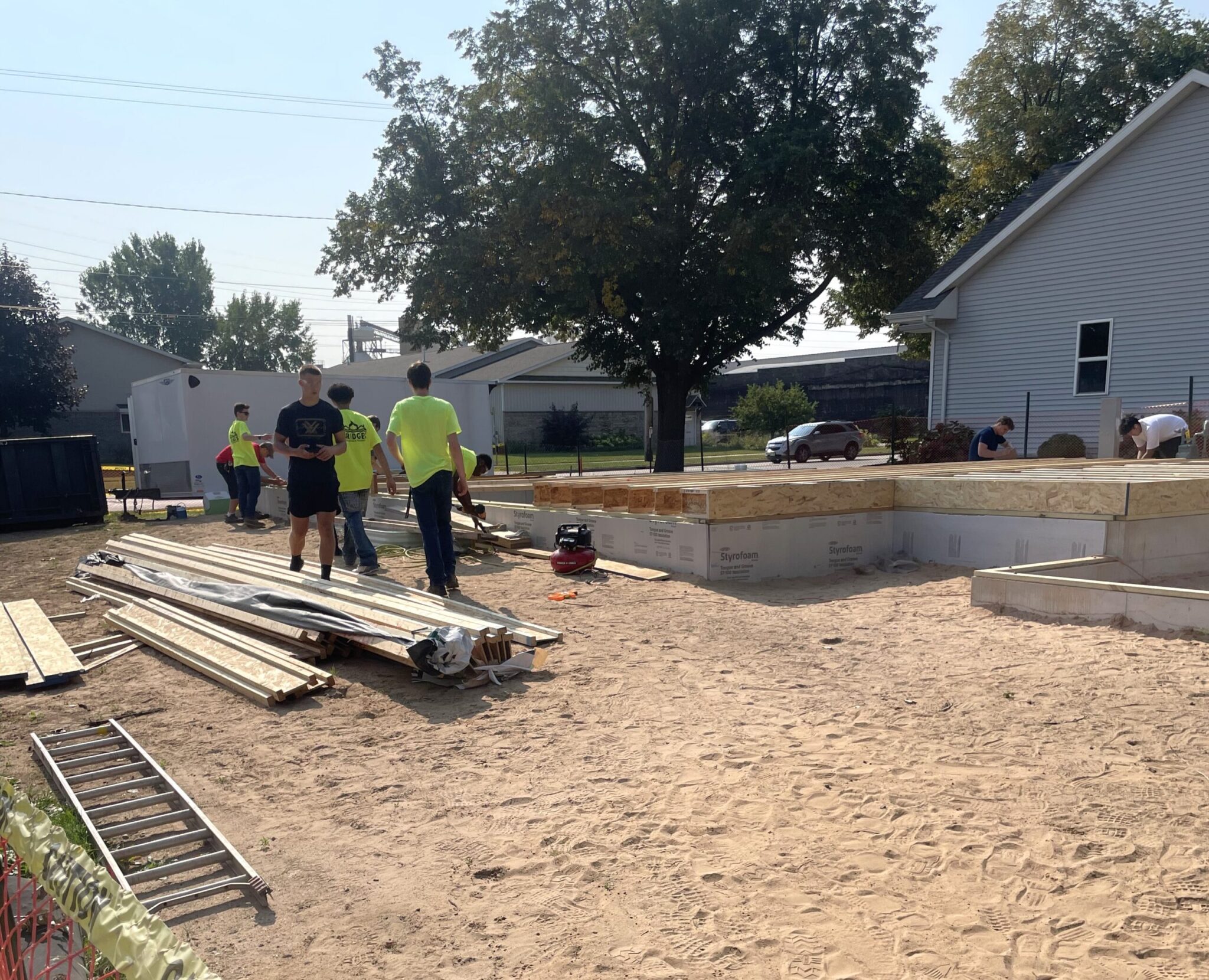NeighborWorks GB Build Site High school students in the Bridges Construction and Renovation program earn college credit and gain hands-on experience building a home in partnership with NeighborWorks Green Bay, with support from community investors.