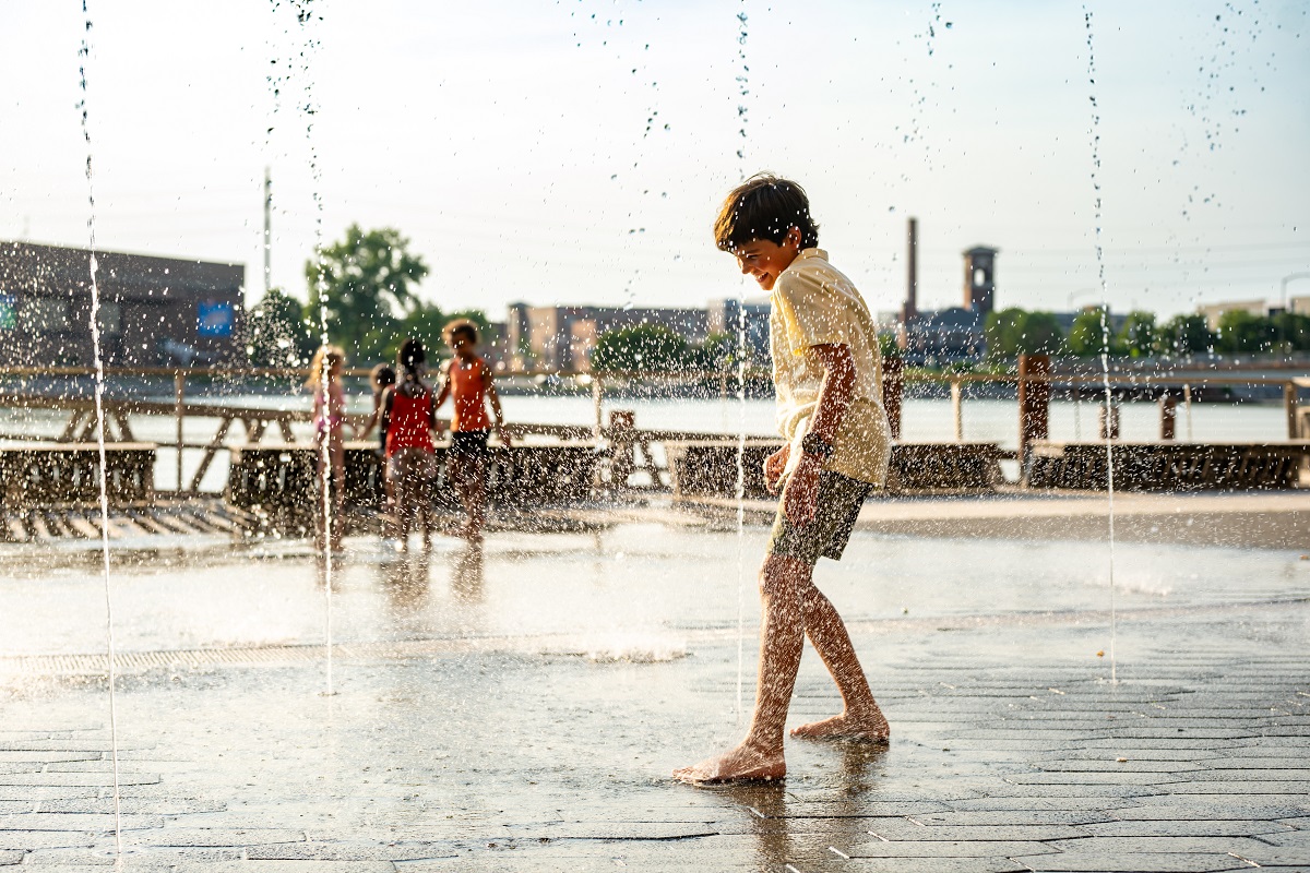 A boy plays on the City Deck in Green Bay, WI